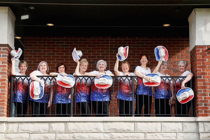 Sweet Harmony singers with patriotic hats